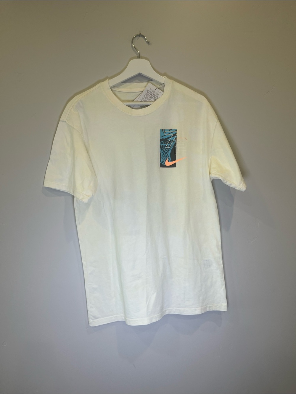 Nike Cream Short-Sleeve Tee with Teal and Coral Graphic